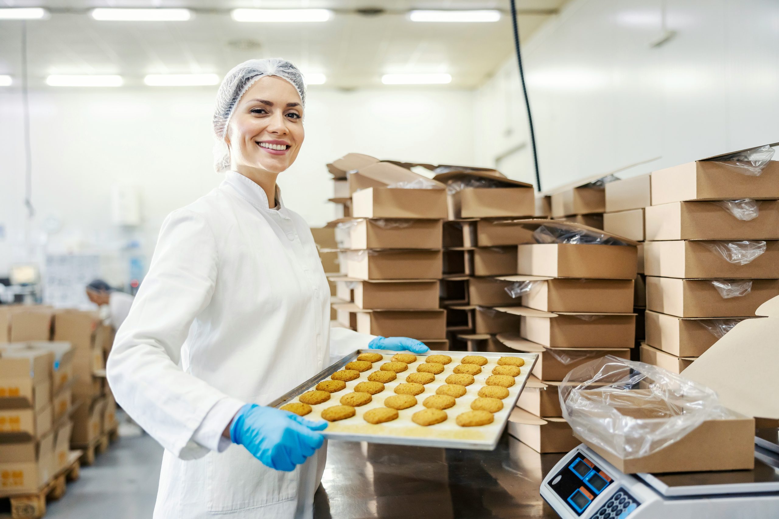 Epicure Creative - Digital Agency in Bedfordshire - Woman showing baked goods production